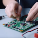 Technitian working with electronic components