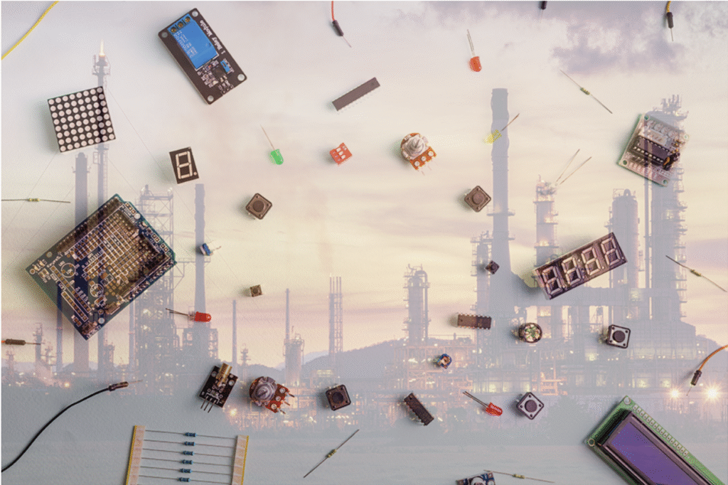 An oil and gas refinery with electronic components superimposed over it