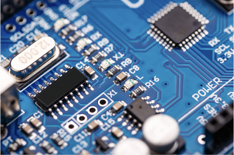 A motherboard showing various obsolete electronic components offered by Summit Electronics.