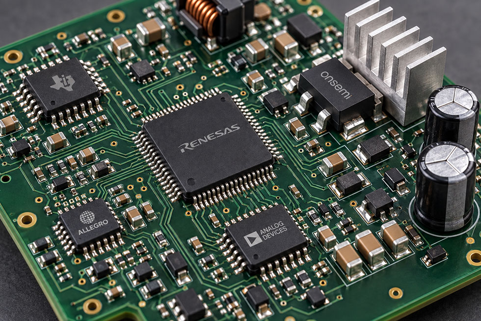 capacitors and resistors on a surface mount circuit board.