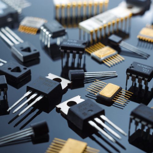 Electronic components close-up. Golden electronic microcircuits.