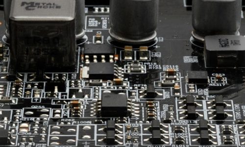Macro close-up image of circuitry (graphics card capactors, resi